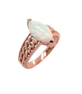 Emotional Rose Gold Opal Oval Ring for October Birthdays from Rafi's Jewelry
